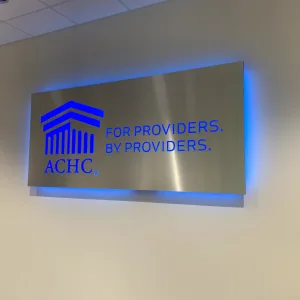 Aluminum logo sign for entrance to office