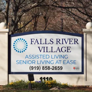 Outdoor business logo monument sign with contact information