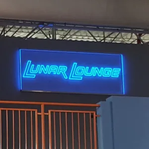 Interior illuminated business name sign mock neon