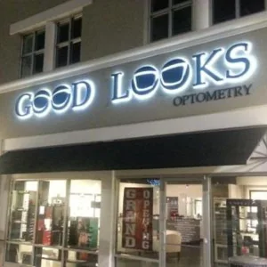 Exterior business illuminated sign with name