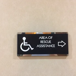 ADA area of assistance directional sign