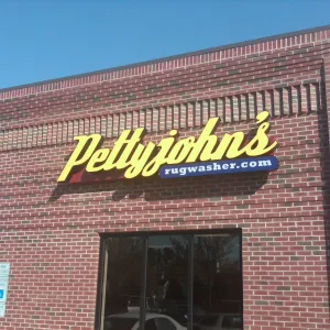 Exterior illuminated storefront sign for business