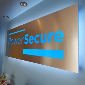 Modern steel cutout logo illuminated interior sign