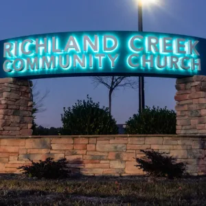 Illuminated exterior monument sign for church