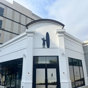 Retail business entrance logo sign