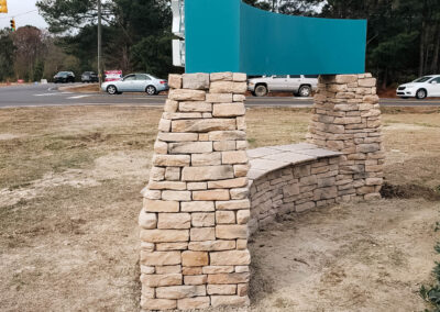 "Side view of Richland Creek Community Church sign showing the detailed stonework and structural design of the sign's support."