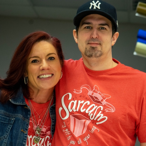 Two team members of SignCraft Solutions